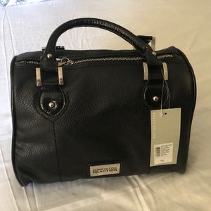 Brand new Kenneth Cole hand bag never used